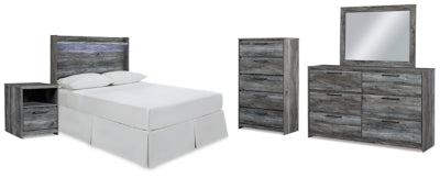 Cabecero de panel completo de la cama Baystorm. Cómoda, espejo, baúl y mesita de noche.