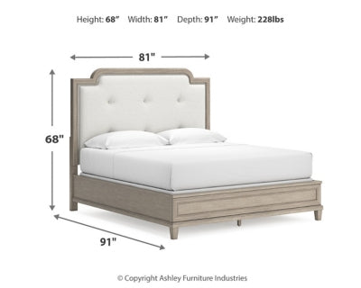 Jorlaina King Upholstered Panel Bed