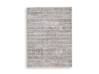 Fuadwick 5'3" x 7' Area Rug